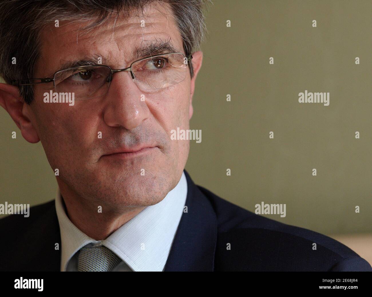Patrick Odier, Chairman of the Swiss Bankers Association and Senior Partner of private bank Lombard Odier (LODH) pauses during an interview with Reuters in Geneva May 9, 2012. Swiss banks need not fear a mass exodus of clients due to deals with several European countries to regularise untaxed assets stashed in secret accounts and a pledge to turn away tax evaders in future, the industry association head told Reuters. 'The chances are much of that money will stay one way or another to be managed professionally in Switzerland,' Odier said. In the wake of the financial crisis, Switzerland has com Stock Photo