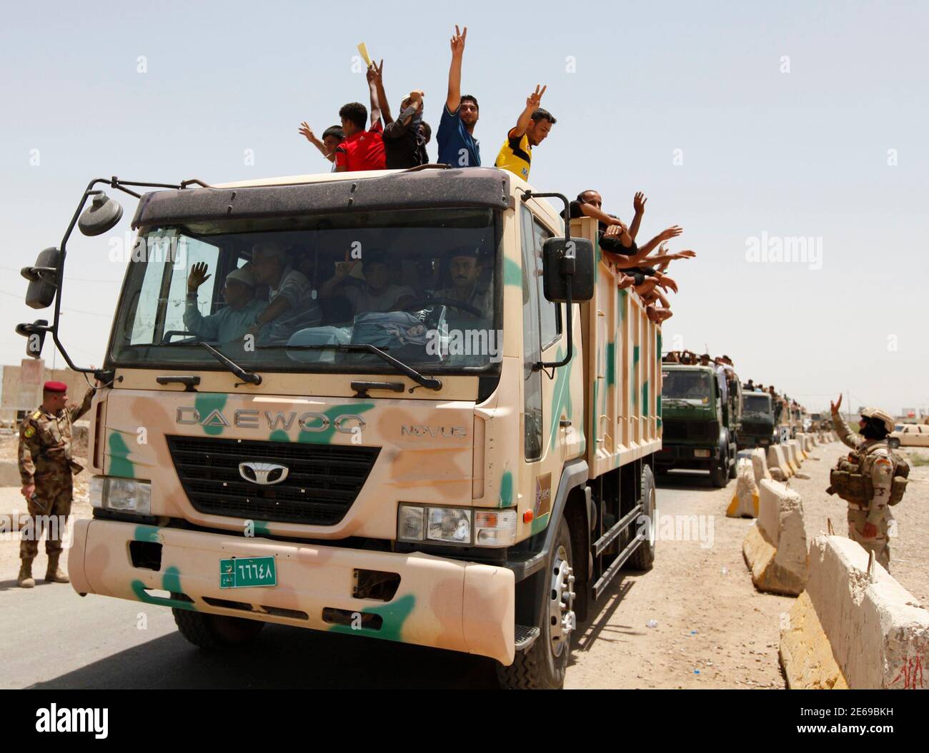 Volunteers Who Have Joined The Iraqi Army To Fight Against The Predominantly Sunni Militants Who Have Taken Over Mosul And Other Northern Provinces Travel In An Army Truck In Baghdad June 12
