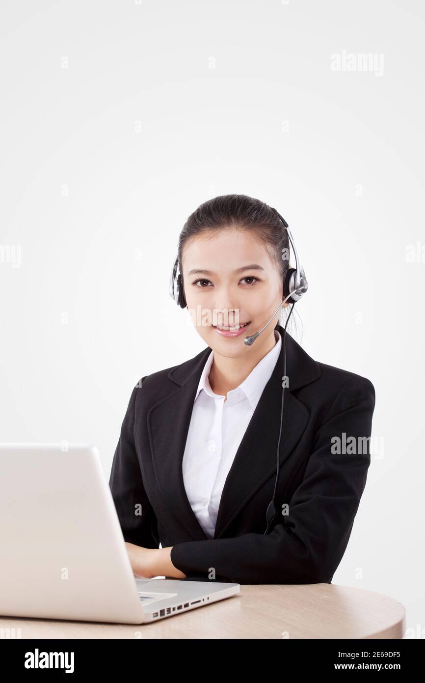Oriental fashion business woman using computer high quality photo Stock Photo