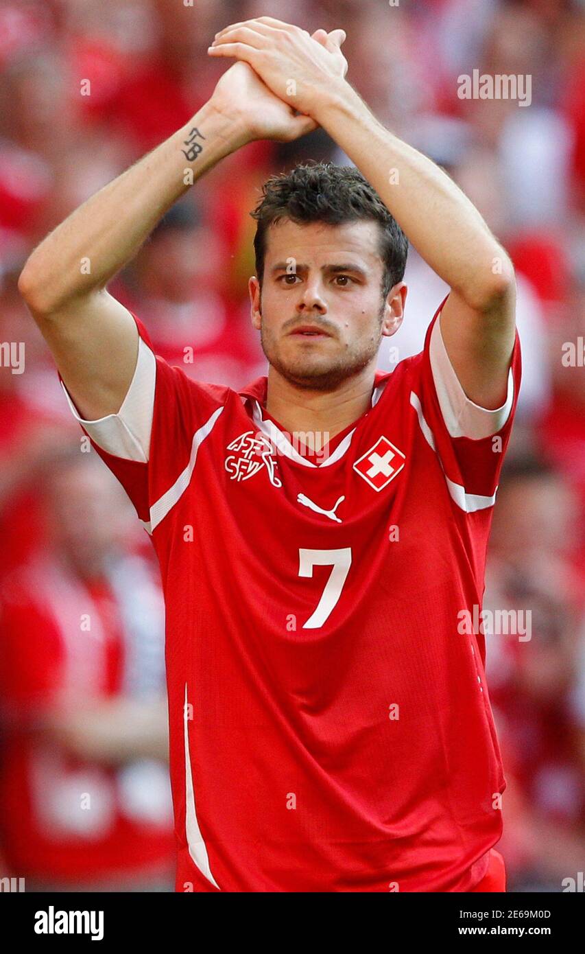 Switzerland's Tranquillo Barnetta reacts at the end of his team's Euro 2012  Group G qualifying soccer match against England at Wembley Stadium in  London June 4, 2011. The match ended in a