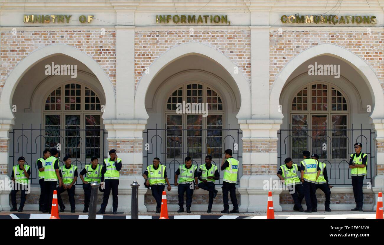 Malaysian Police Officers Gather Before Taking Their Positions In Front Of Malaysia S Historical Landmark The Sultan Abdul Samad Building Near The Independence Square In Kuala Lumpur April 27 2012 Malaysian Police Backed