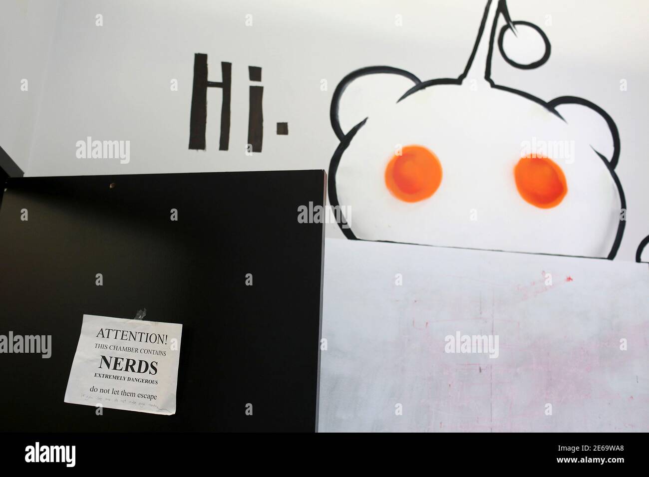 A sign hangs on the door of an office at Reddit headquarters in San  Francisco, California April 15, 2014. Reddit, a website with a retro-'90s  look and space-alien mascot that tracks everything