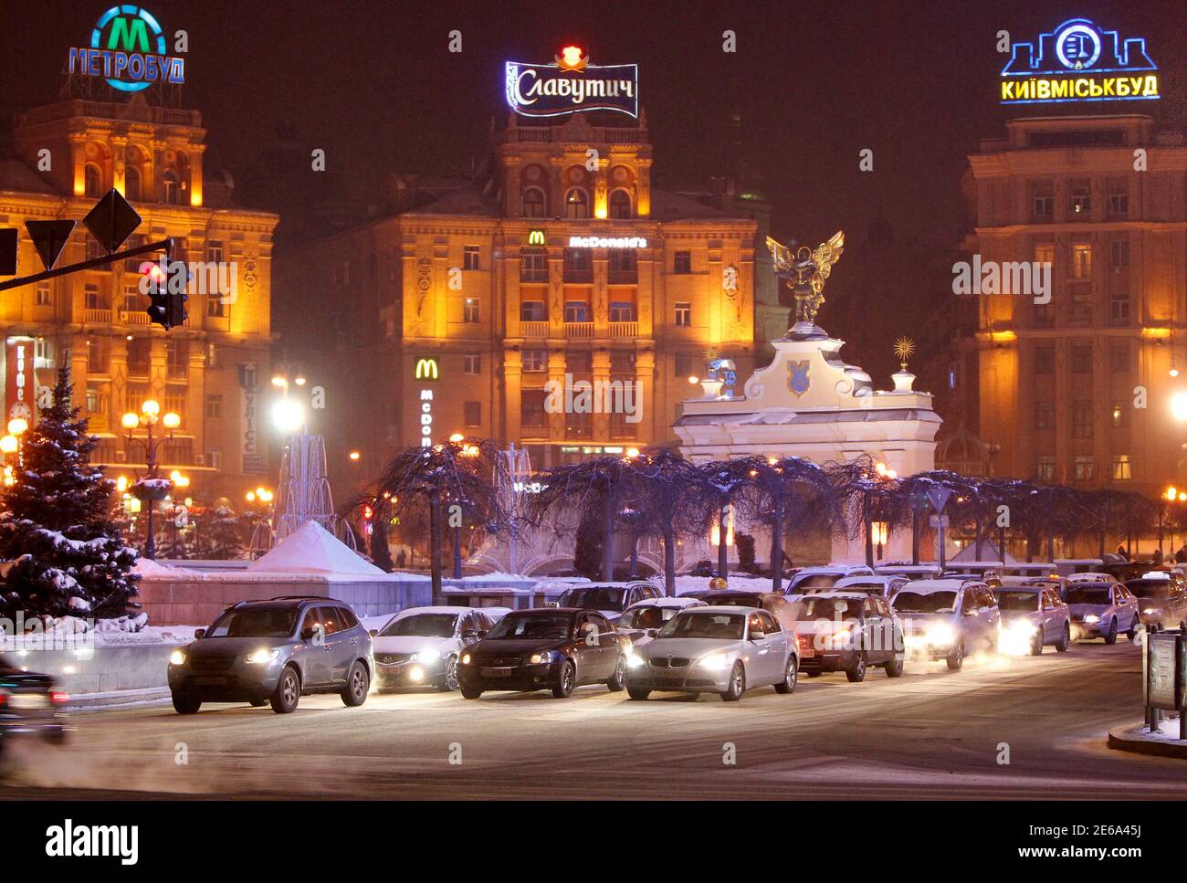 Cars drive around the city centre of Ukrainian capital Kiev with  temperature around minus 18 degree Celsius (minus 0.4 degrees Fahrenheit)  February 3, 2012. 38 more deaths from a cold snap have