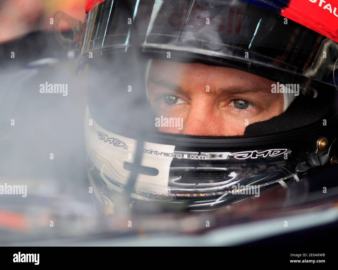 Steam From A Cooling System Rises From The Cockpit Of Red Bull Formula One Driver Sebastian Vettel Of Germany During The Third Practice Session Of The Bahrain F1 Grand Prix At The