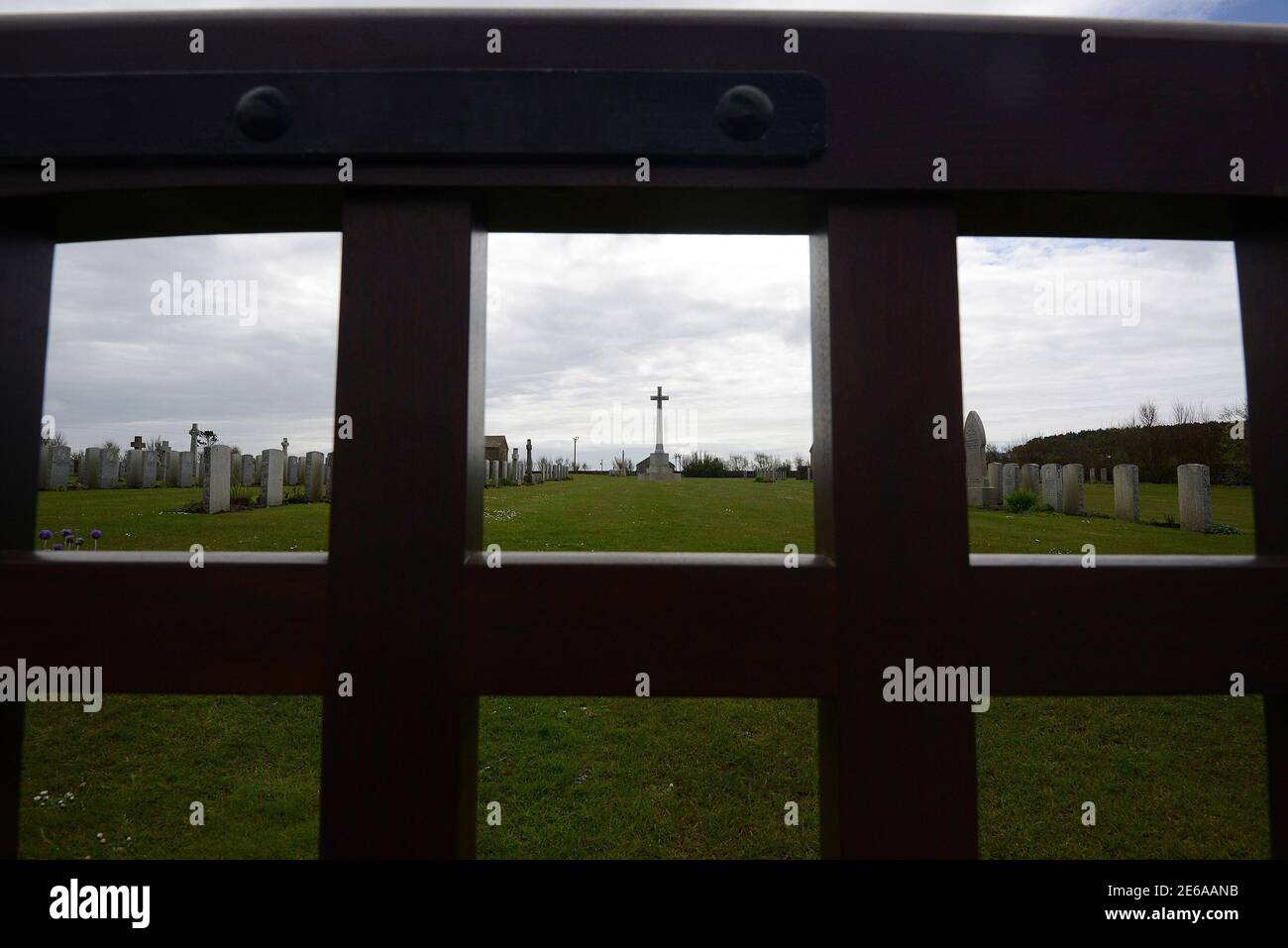Graves stand in Lyness Naval cemetery on the island of Hoy in the Orkney Islands, Scotland May 6, 2014. During both World Wars, Scapa Flow was an important British naval base, and the site of significant loss of life. Following the end of World War One, 74 German warships were interned there, and on June 21, 1919 most were deliberately sunk, or scuttled, at the orders of German Rear Admiral Ludwig Von Reuter, who mistakenly thought that the Armistice had broken down and wanted to prevent the British from using the ships. Now Scapa Flow is a popular site for divers, who explore the few wrecks t Stock Photo