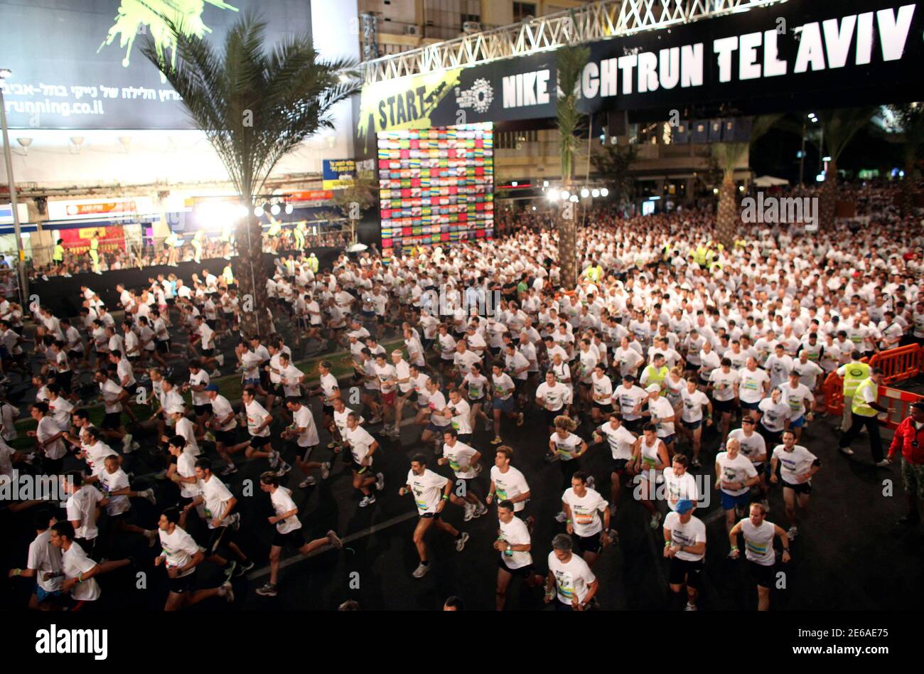 Participants start a 10km (6.2 miles) night run from Rabin Square in Tel  Aviv October 10,