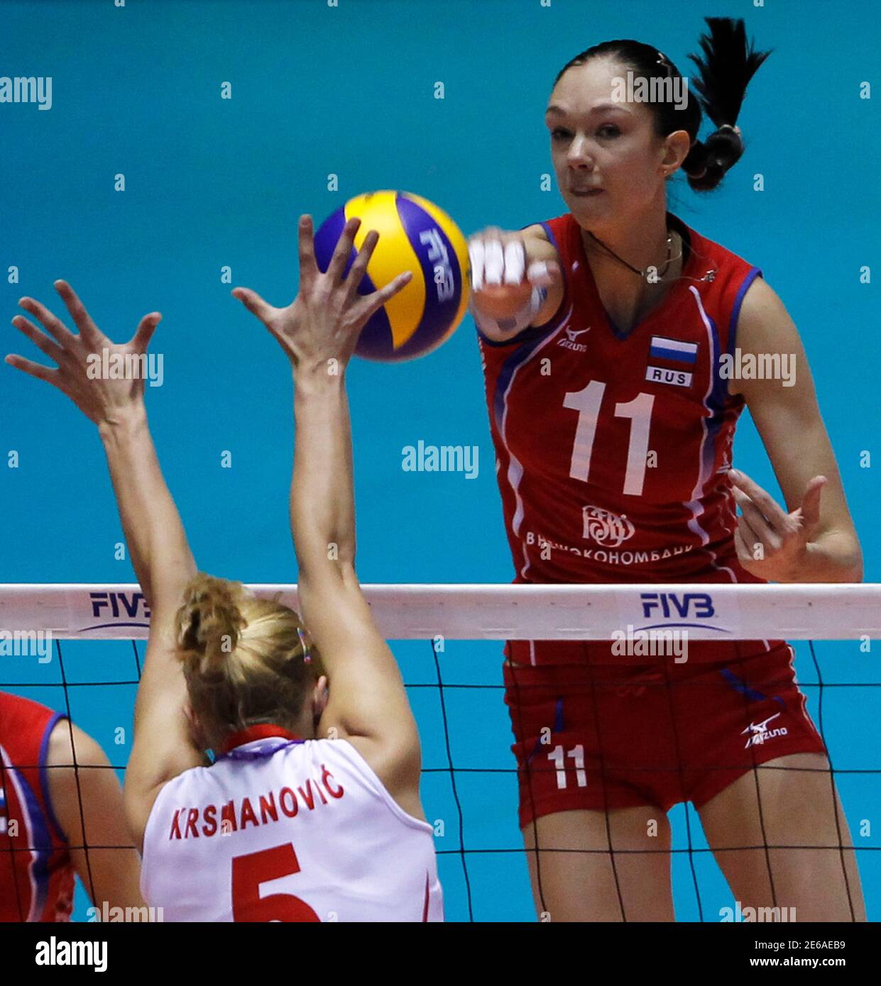 Russia S Ekaterina Gamova R Spikes The Ball Against Serbia S Natasa Krsmanovic During Their