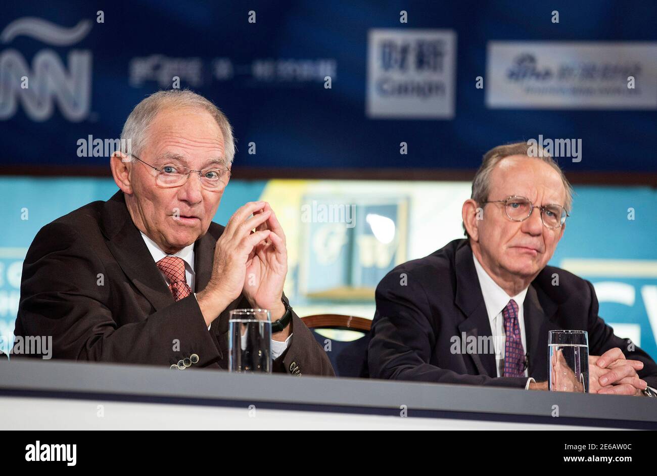 Germany's Minister of Finance Wolfgang Schauble (L) and Italy's Minister of Economy and Finance Pier Carlo Padoan participate in a discussion on 'A Reform Agenda for Europe's Leaders' during the World Bank/IMF annual meetings in Washington October 9, 2014.      REUTERS/Joshua Roberts    (UNITED STATES - Tags: POLITICS BUSINESS) Stock Photo