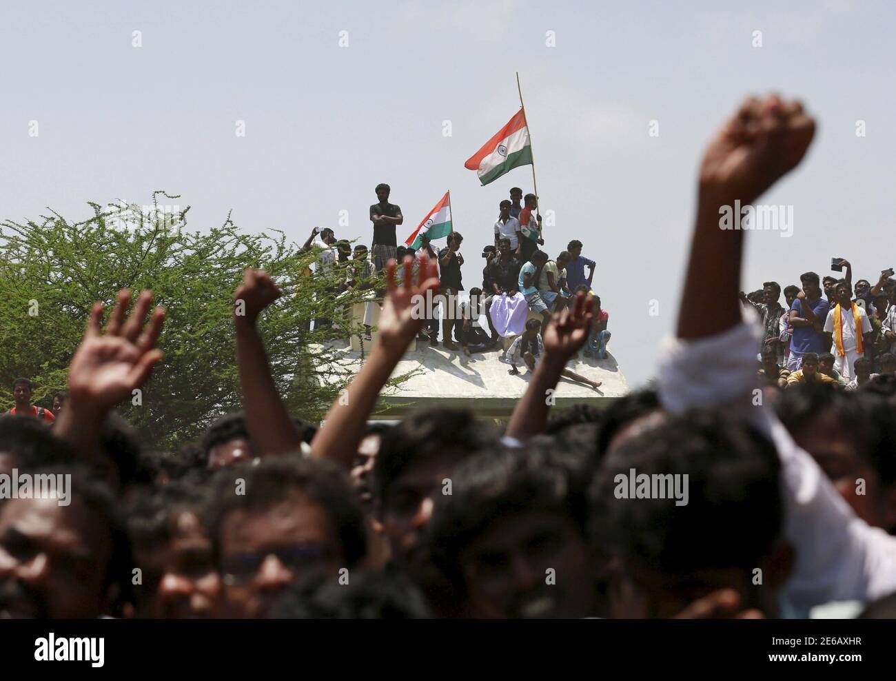 People shout slogans as they attend the funeral ceremony of former Indian President A.P.J. Abdul Kalam in Rameswaram, India, July 30, 2015. Kalam, considered the father of the country's missile programme, died on Monday in hospital at the age of 83, a doctor said. Popularly known as 'Missile Man,' Kalam led the scientific team that developed missiles able to carry India's nuclear warheads. He became a national folk hero after helping oversee nuclear tests in 1998 that solidified India's status as a nuclear weapons state. REUTERS/Danish Siddiqui Stock Photo