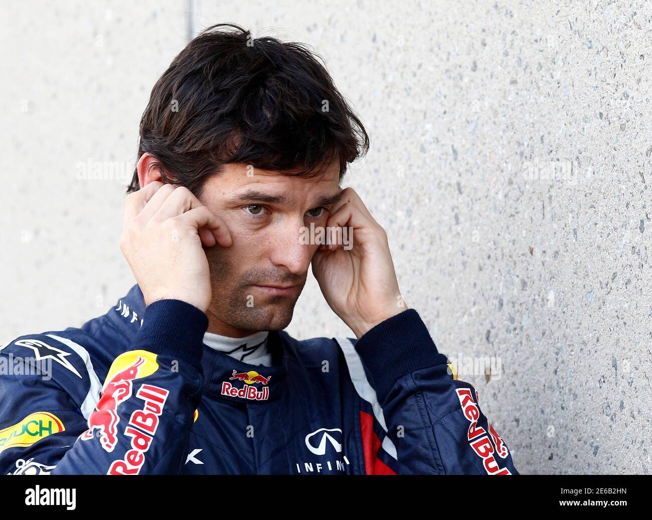Red Bull Formula One driver Mark Webber of Australia waits for the first practice session of the Canadian F1 Grand Prix at the Circuit Gilles Villeneuve in Montreal June 10, 2011.  REUTERS/Chris Wattie (CANADA  - Tags: SPORT MOTOR RACING) Stock Photo
