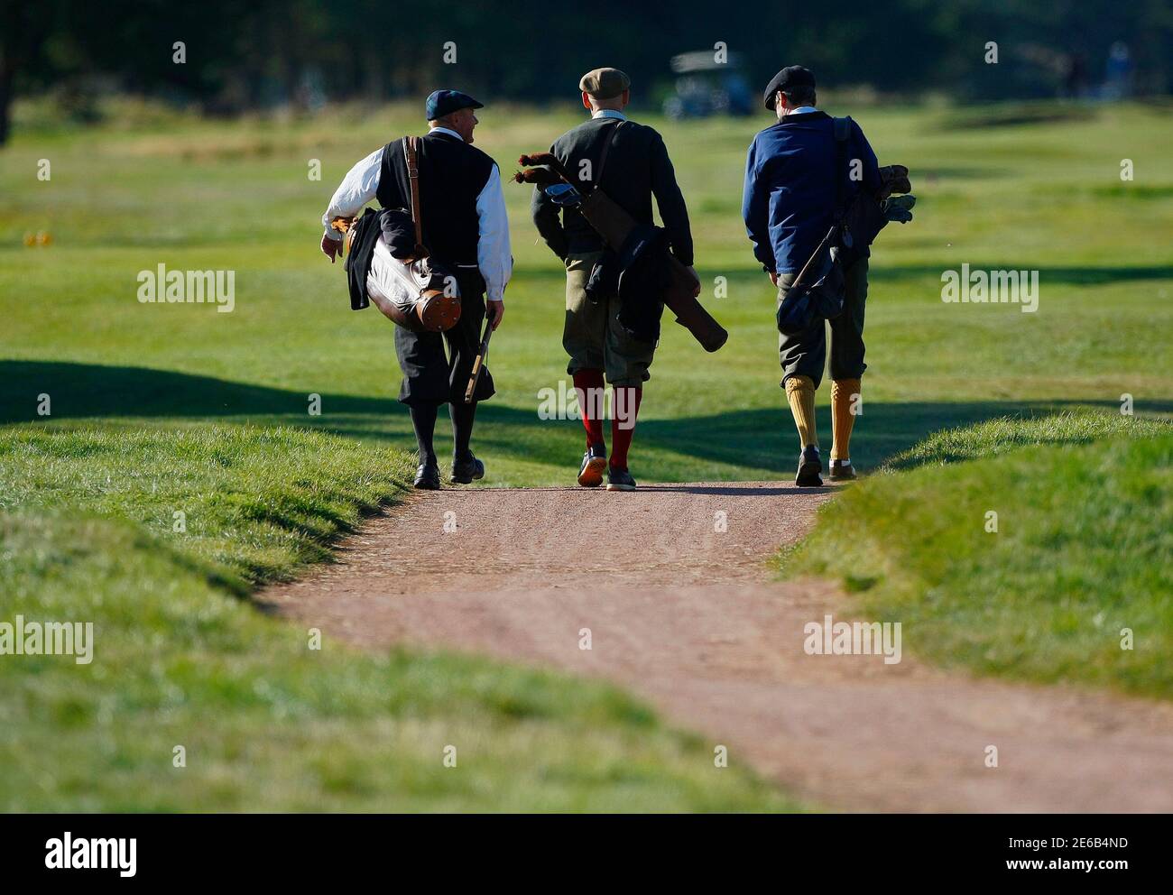 Competitors taking part in the World Hickory Open Golf Championship walk  together during the first round at Monifeith Links golf course in  Monifeith, east Scotland October 8, 2012. The tournament, now in