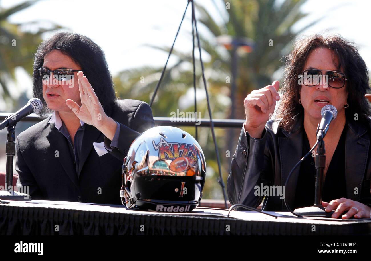 Musicians Gene Simmons (L) and Paul Stanley of rock band KISS attend a news conference to announce their part-ownership of Arena Football League team, the Los Angeles Kiss, in Anaheim, California March 10, 2014. The LA Kiss will play their home games in Anaheim and the season kick-off will include a concert by KISS. REUTERS/Alex Gallardo (UNITED STATES - Tags: ENTERTAINMENT SPORT) Stock Photo