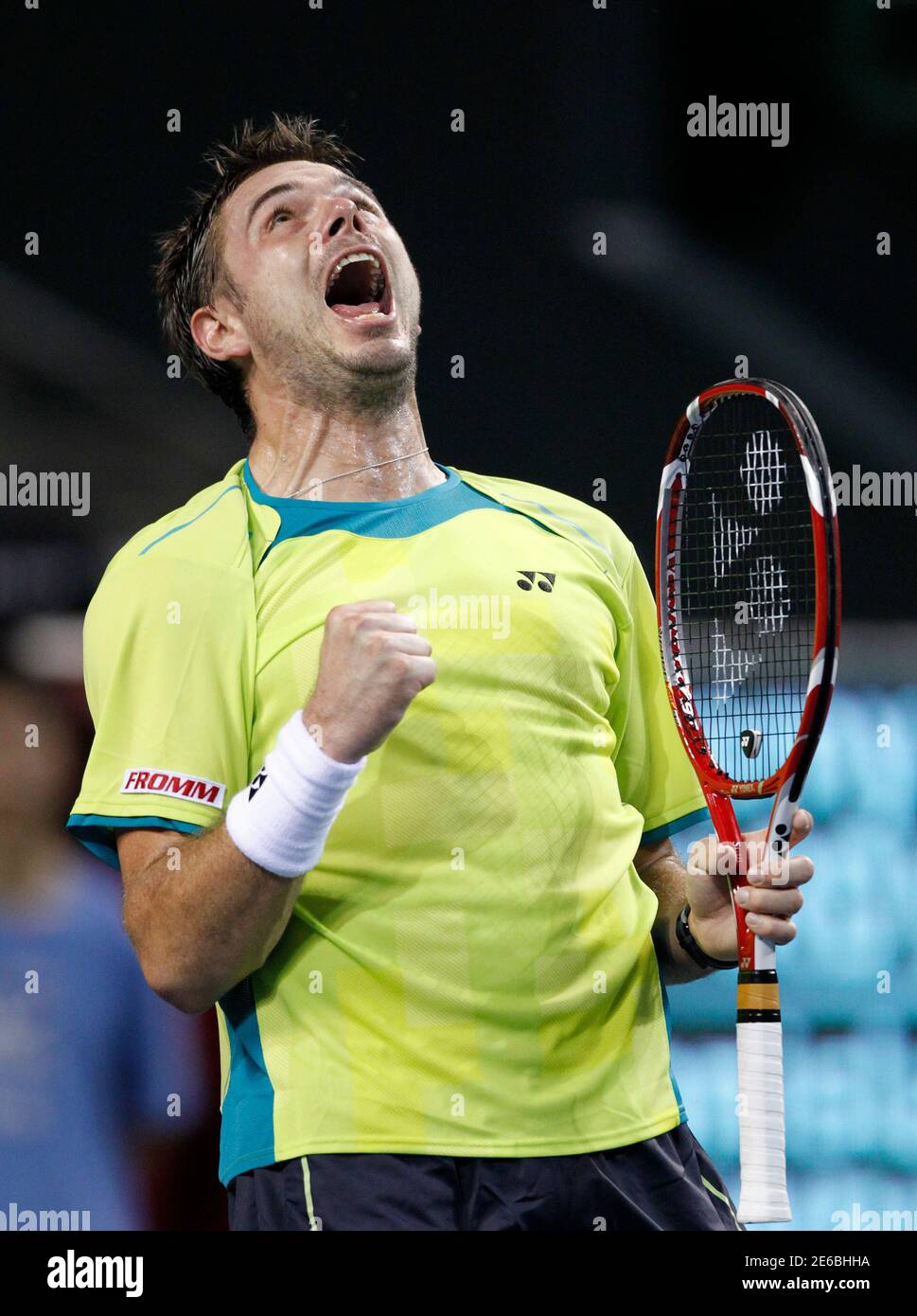 Stanislas Wawrinka of Switzerland celebrates his win over Jeremy Chardy of  France during their men's singles match at the Japan Open tennis  championships in Tokyo, October 3, 2012. REUTERS/Yuriko Nakao (JAPAN -