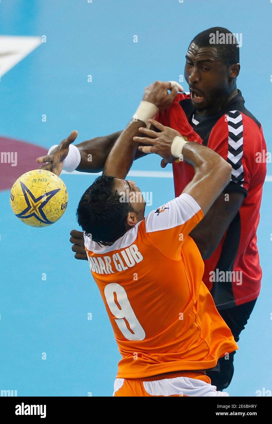 Selmi Hedoui R Of Qatar S Al Rayyan Tries To Pass Next To Hasan Alkhadrawi Of Saudi Arabia S Mudhar During The Asian Handball Club Championship In Doha November 10 2012 Reuters Fadi Al Assaad Qatar