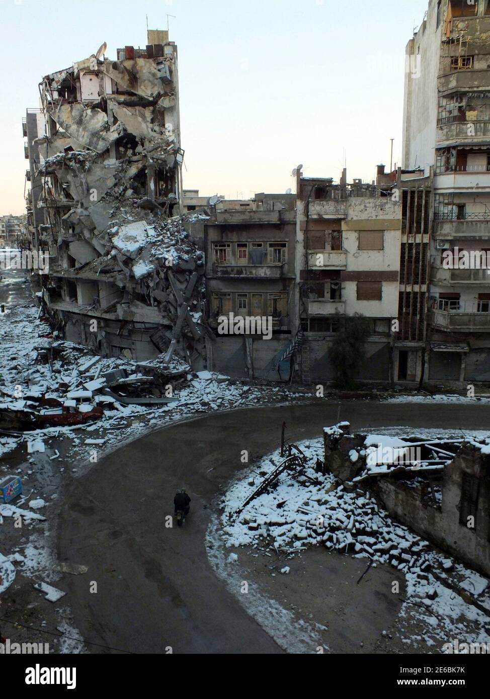 A view of a damaged neighborhood at Jouret al Shayah area in Homs January 10, 2013. Picture taken January 10, 2013.  REUTERS/Yazan Homsy (SYRIA - Tags: CONFLICT POLITICS CIVIL UNREST) Stock Photo