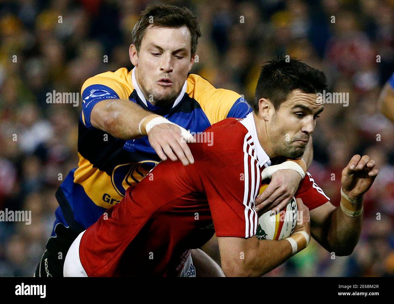 British and Irish Lions player Conor Murray (front) scores a try as Combined NSW-Queensland Country's Nathan Trist fails to stop him during their rugby union game at Hunter Stadium in Newcastle June 11, 2013.  REUTERS/Daniel Munoz (AUSTRALIA - Tags: SPORT RUGBY) Stock Photo