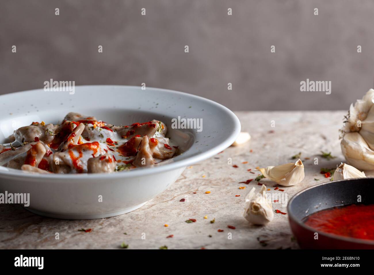 Traditional Turkish manti is a form of dumpling made with ground meat
