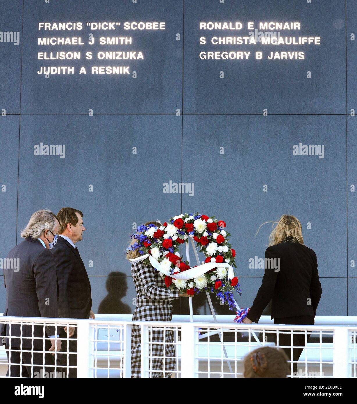 NO FILM, NO VIDEO, NO TV, NO DOCUMENTARY - The sun illuminates the seven names of the astronauts killed in the 1986 Challenger shuttle disaster as a wreath is laid at the base of the Space Mirror Memorial during a 35th anniversary commemoration ceremony at Kennedy Space Center, Florida on Thursday, January 28, 2021. Photo by Joe Burbank/Orlando Sentinel/TNS/ABACAPRESS.COM Stock Photo