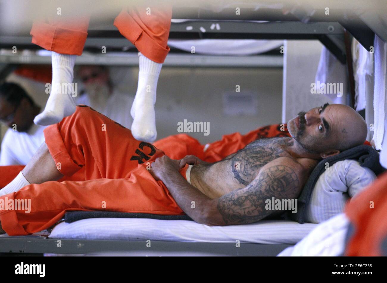 Inmates sit in a recreation room where they are housed due to overcrowding at the California Institution for Men state prison in Chino, California, June 3, 2011. The Supreme Court has ordered California to release more than 30,000 inmates over the next two years or take other steps to ease overcrowding in its prisons to prevent "needless suffering and death." California's 33 adult prisons were designed to hold about 80,000 inmates and now have about 145,000. The U.S. has more than 2 million people in state and local prisons. It has long had the highest incarceration rate in the world. REUTERS/ Stock Photo