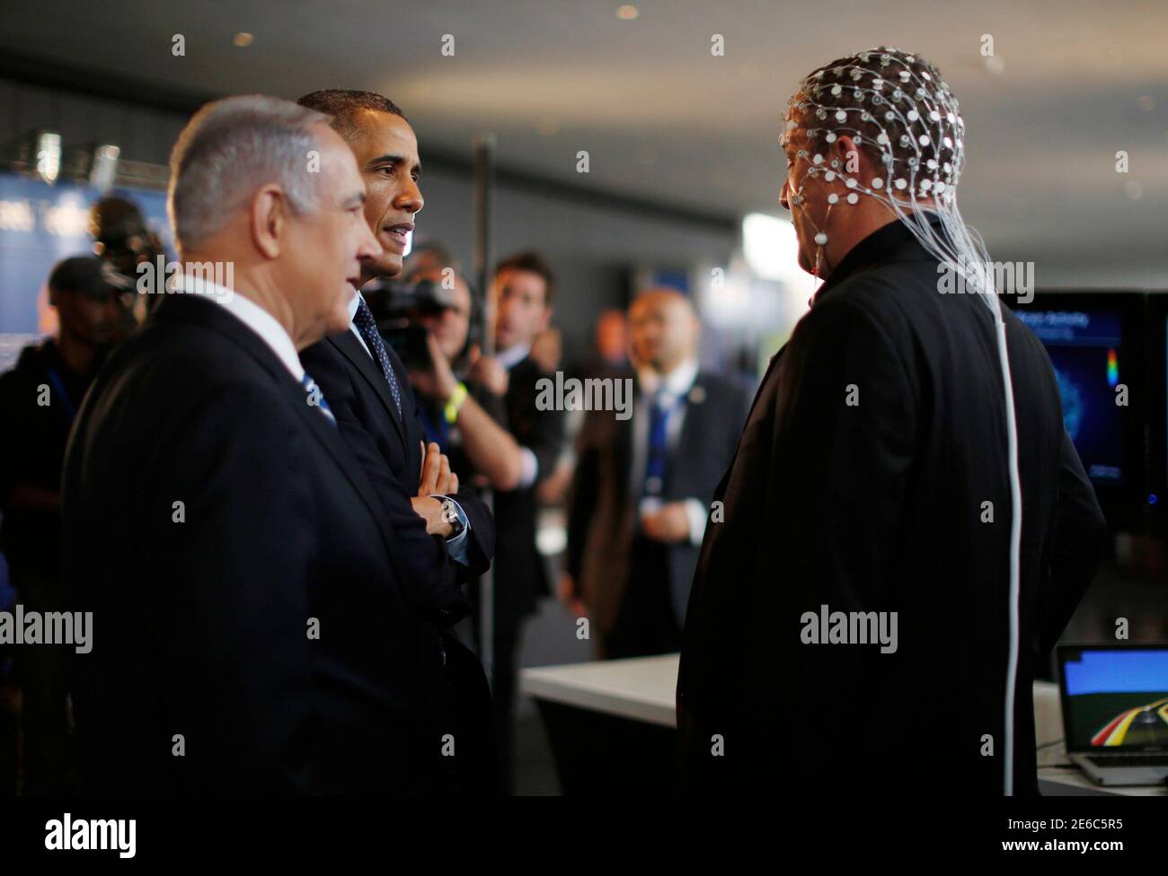 U.S. President Barack Obama and Israeli Prime Minister Benjamin Netanyahu speak with Professor Amir Geva, head of the biomedical signal processing and pattern recognition lab at the Ben-Gurion University of the Negev, as they tour a technology expo at the Israel Museum in Jerusalem March 21, 2013.   REUTERS/Jason Reed   (JERUSALEM - Tags: POLITICS) Stock Photo