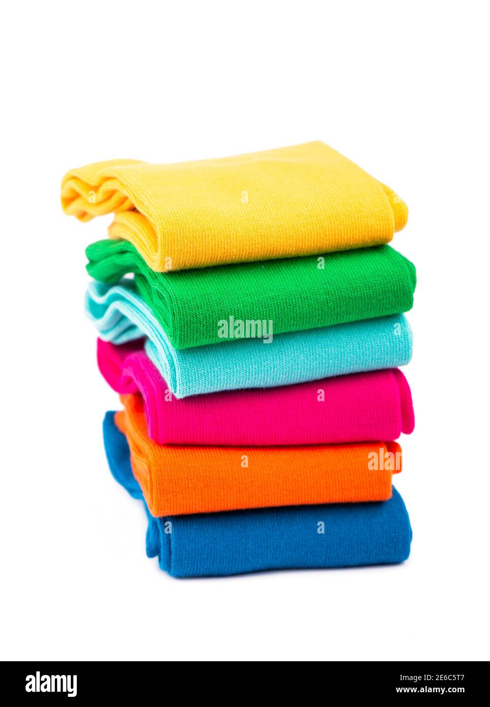 colored socks stacked on a white background Stock Photo
