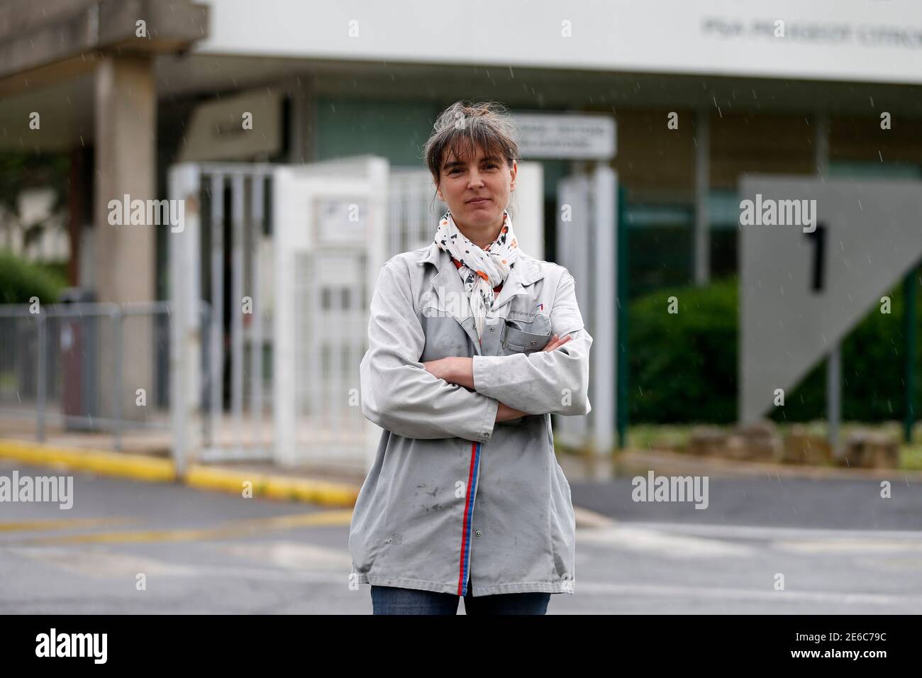 Peugeot Employee Agathe Martin Poses In Front Of The Main Entrance Of Psa Peugeot Plant At Aulnay Sous Bois June 13 13 The Car Plant Where 46 Year Old Agathe Martin Works Is Shutting Down But