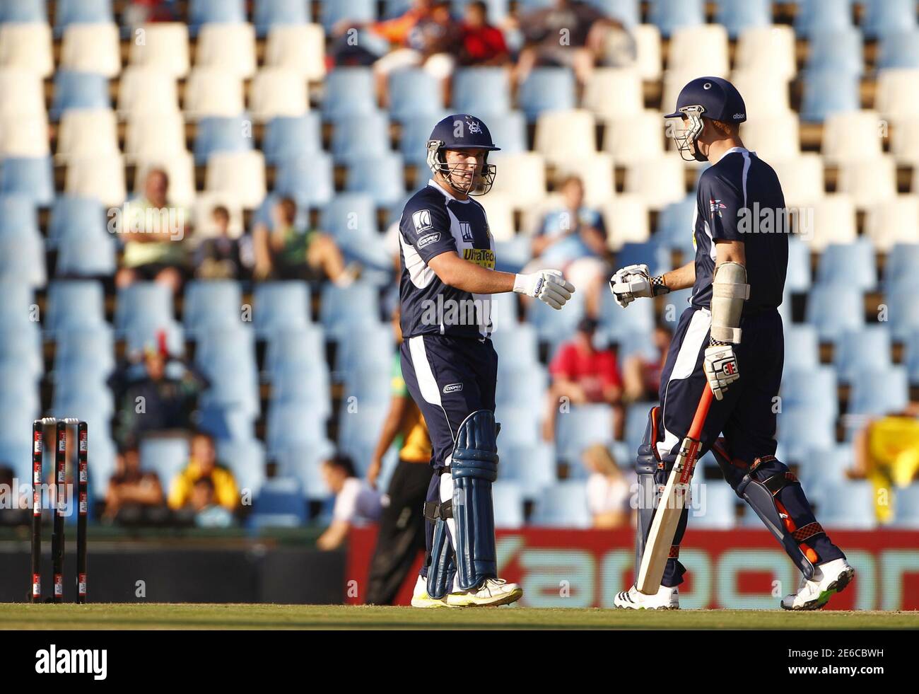 Aaron Finch of the Victoria Bushrangers (L) is congratulated by his team  mate Andrew McDonald during their Twenty20 cricket match at Centurion in  Pretoria September 15, 2010. REUTERS/Siphiwe Sibeko (SOUTH AFRICA -