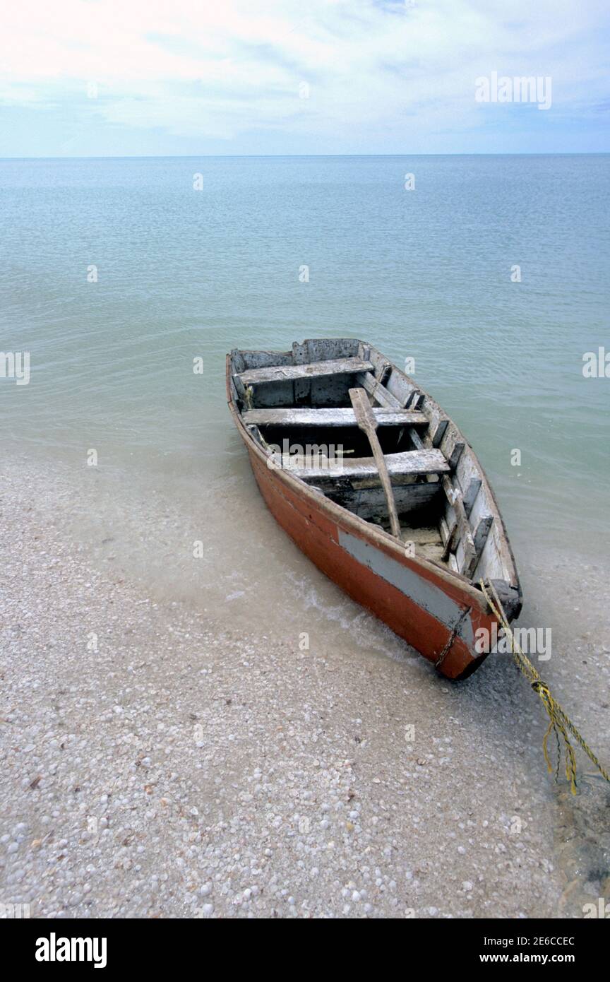 Dilapidated rowboat on beach at Celustun, Yucatan Peninsula, Mexico Stock Photo