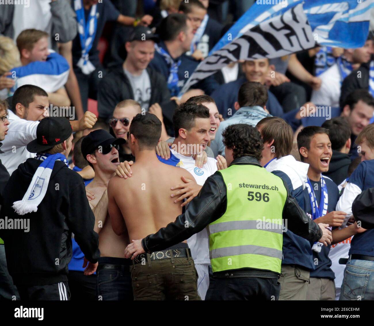 Grasshopper Club's (GC) Vincenzo Renella (C) celebrates his goal with the  fans during their Swiss Super League soccer match against FC Zurich in  Zurich May 15, 2011. REUTERS/Romina Amato (SWITZERLAND - Tags: