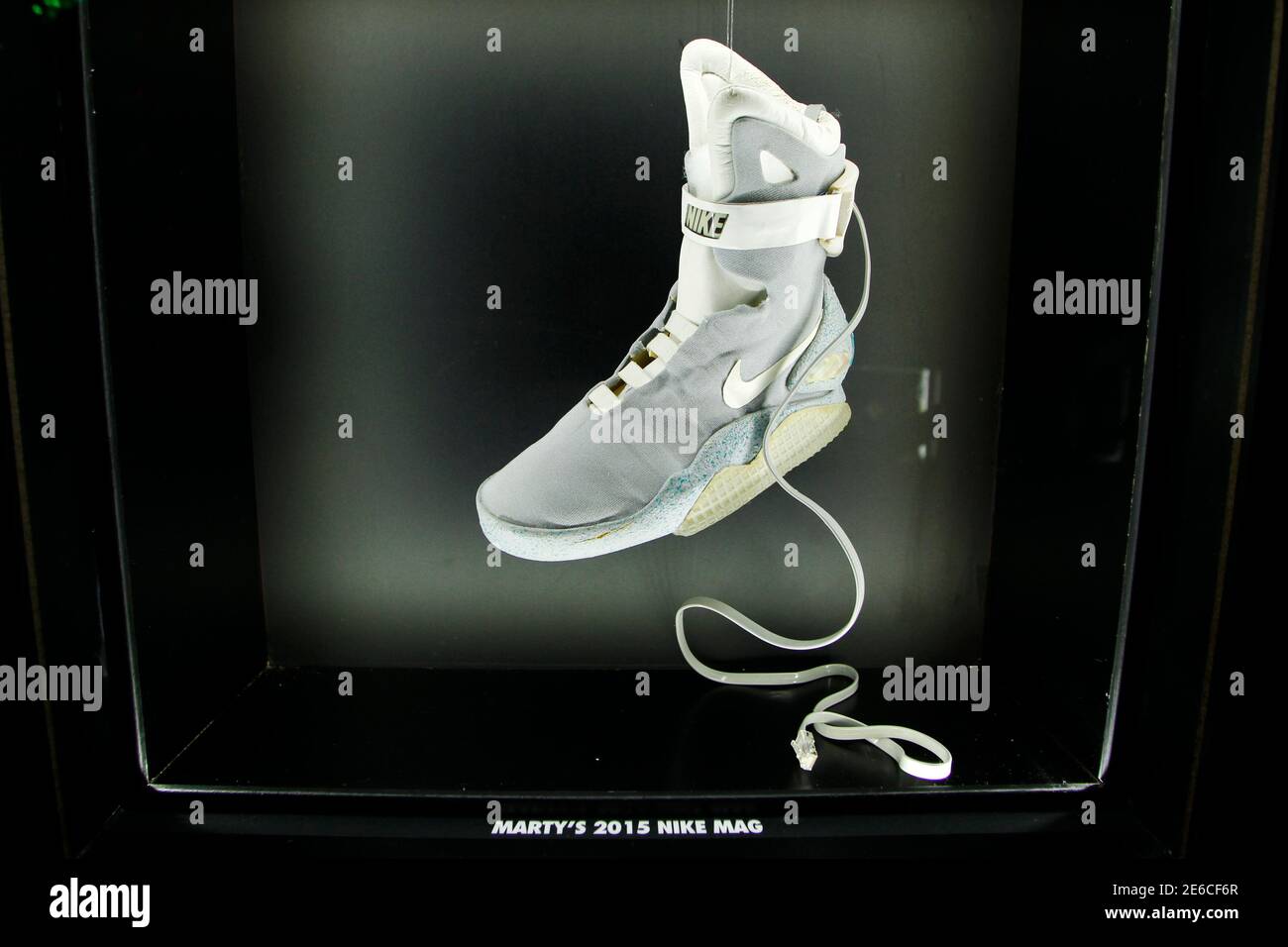 A 2015 NIKE MAG shoe prop worn by the "Back to the Future" character Marty  McFly, played by Michael J. Fox, is displayed during the unveiling of the  2011 NIKE MAG shoes