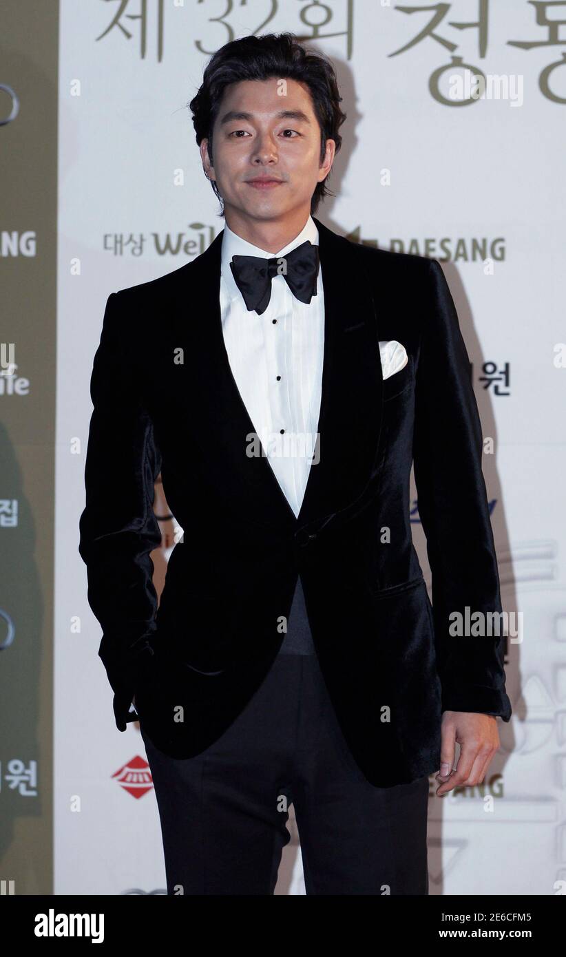 South Korean actor Gongyoo poses for photographs before the Blue Dragon Film Awards in Seoul November 25, 2011. REUTERS/Jo Yong-Hak (SOUTH KOREA - Tags: ENTERTAINMENT) Stock Photo