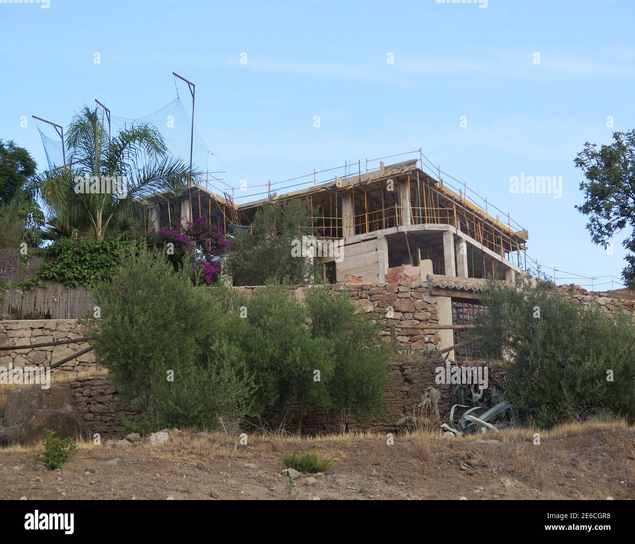 New building rising on hill in Spanish village Stock Photo - Alamy