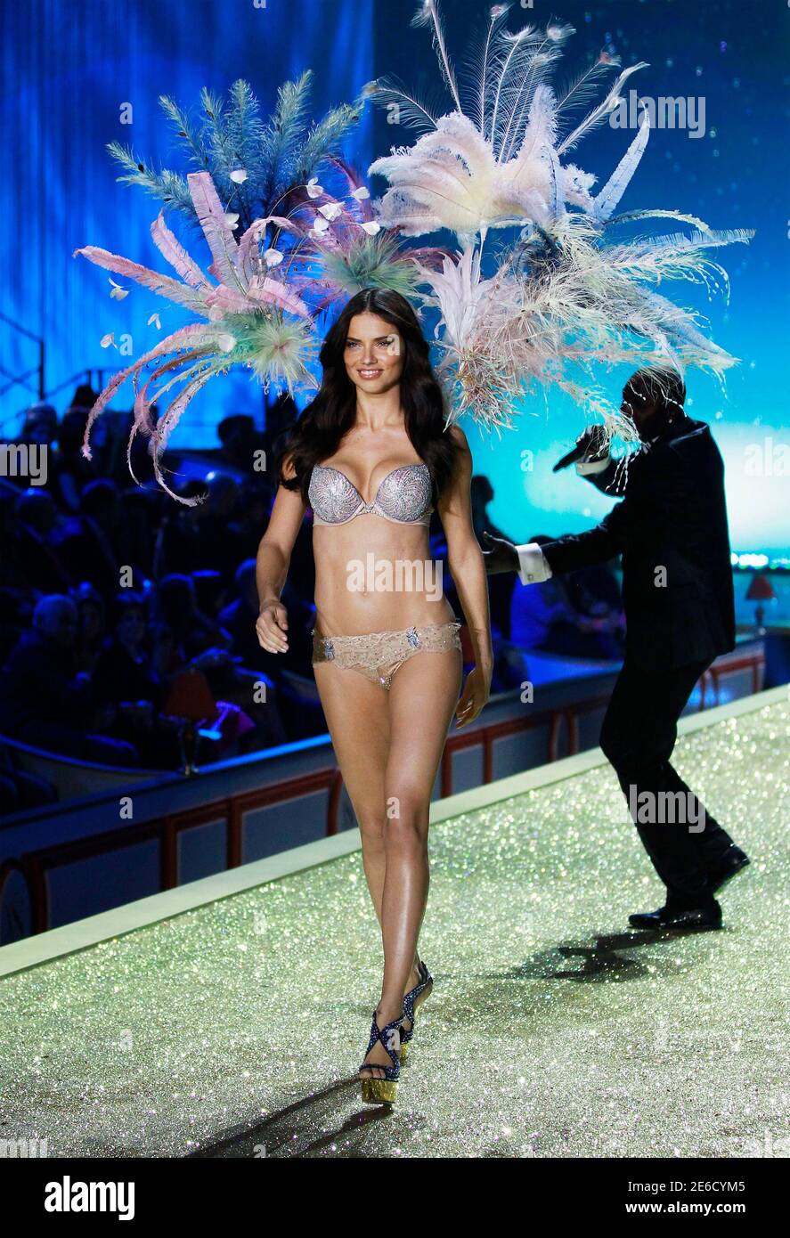 Model Adriana Lima presents the Bombshell Fantasy Bra designed by Damiani  Jewellers during the Victoria's Secret Fashion Show at the Lexington Armory  in New York November 10, 2010. The one-of-a-kind bra is