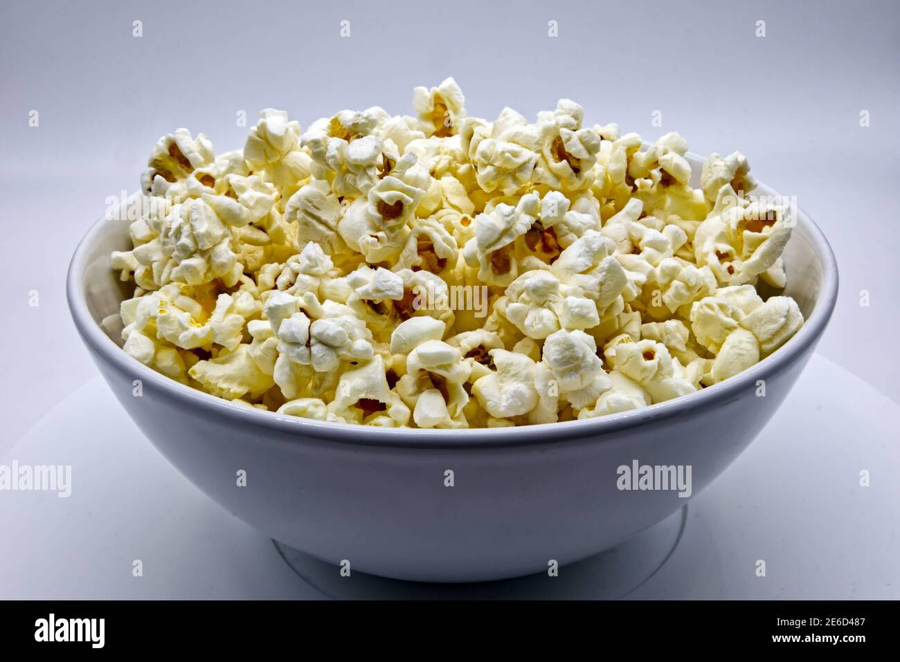 A bowl of Popcorn isolated on white background Stock Photo