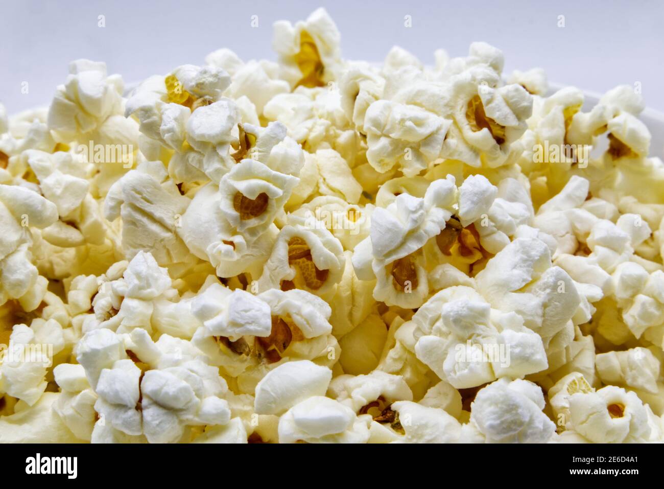 A bowl of Popcorn isolated on white background Stock Photo