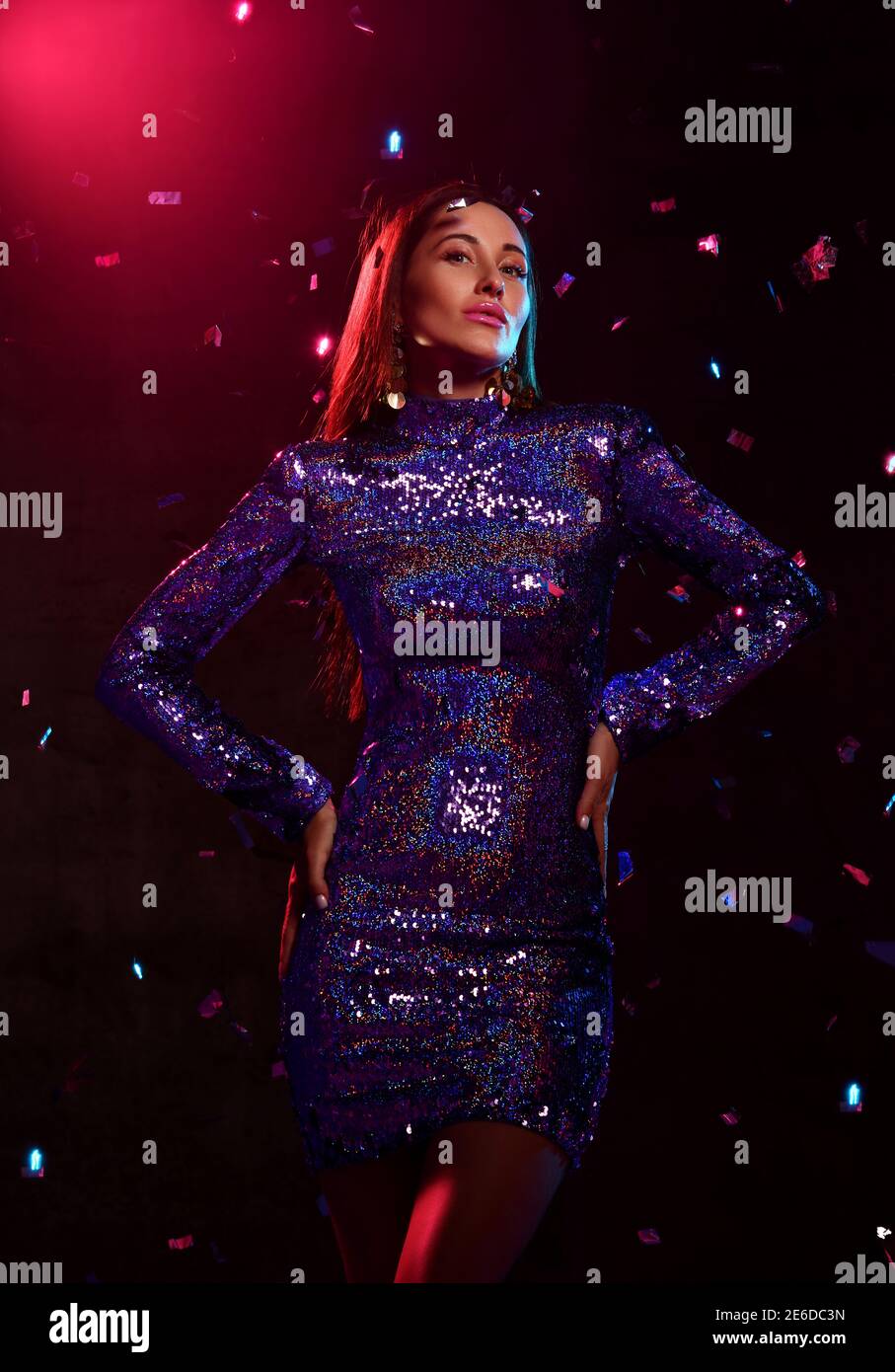 Tall sexy brunette woman in glittering tight mini dress and stylish accessories stands under confetti fall Stock Photo - Alamy Tall sexy brunette woman in glittering tight mini dress and stylish accessories stands under confetti fall Stock Photo - Alamy