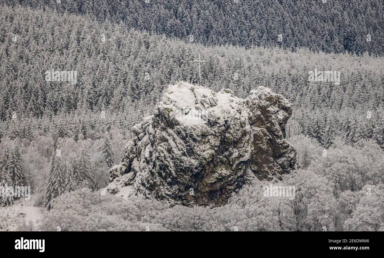 Aerial view of the rock formation Bruchhauser Steine a ground monument with four main rocks on the Istenberg in the Rothaargebirge in winter with snow Stock Photo