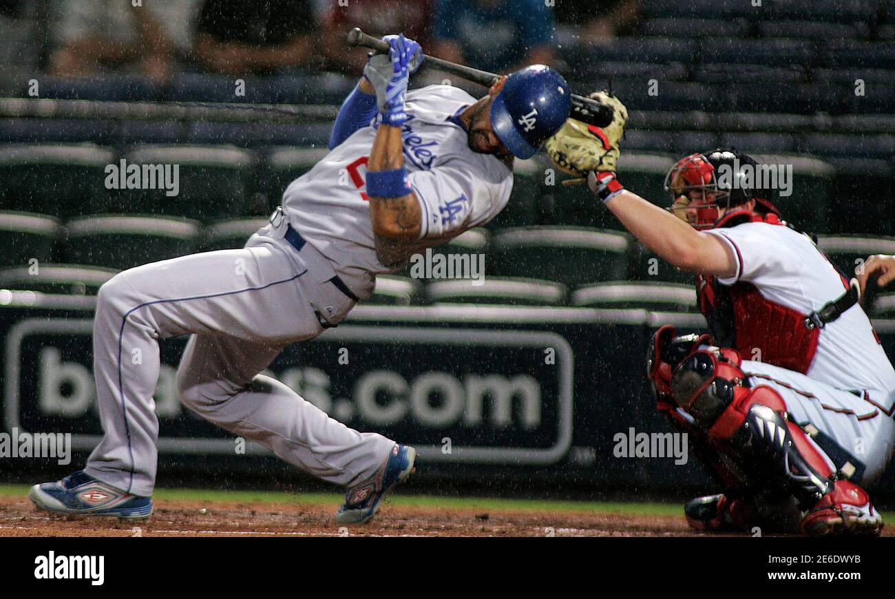 Los Angeles Dodgers Batter Scott Podsednik L Dodges A Wild Pitch As Atlanta Braves Catcher Brian Mccann Makes The Catch In The Fourth Inning Of Their National League Mlb Baseball Game Action Los Angeles Dodgers Batter Scott Podsednik L Dodges A Wild Pitch As Atlanta Braves Catcher Brian Mccann Makes The Catch In The Fourth Inning Of Their National League Mlb Baseball Game Action