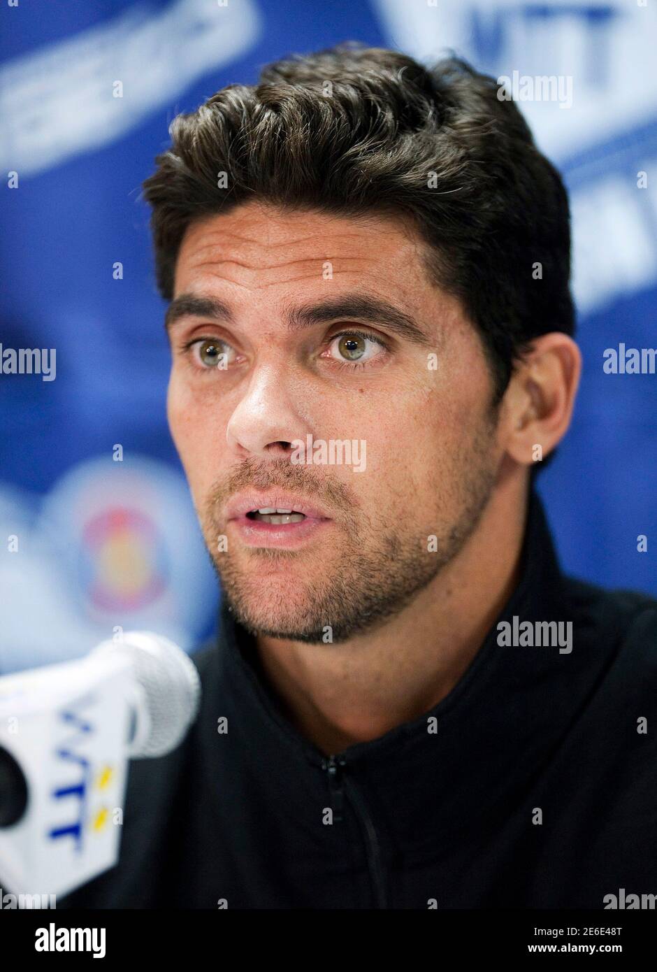 Mark Philippoussis speaks at a news conference for the World Team Tennis Smash Hits fundraiser in Washington November 15, 2010. The event will raise money for the Elton John AIDS Foundation and local Washington, D.C. Area AIDS charities, according to the World Team Tennis website. REUTERS/Joshua Roberts  (UNITED STATES - Tags: SPORT ENTERTAINMENT TENNIS HEADSHOT) Stock Photo
