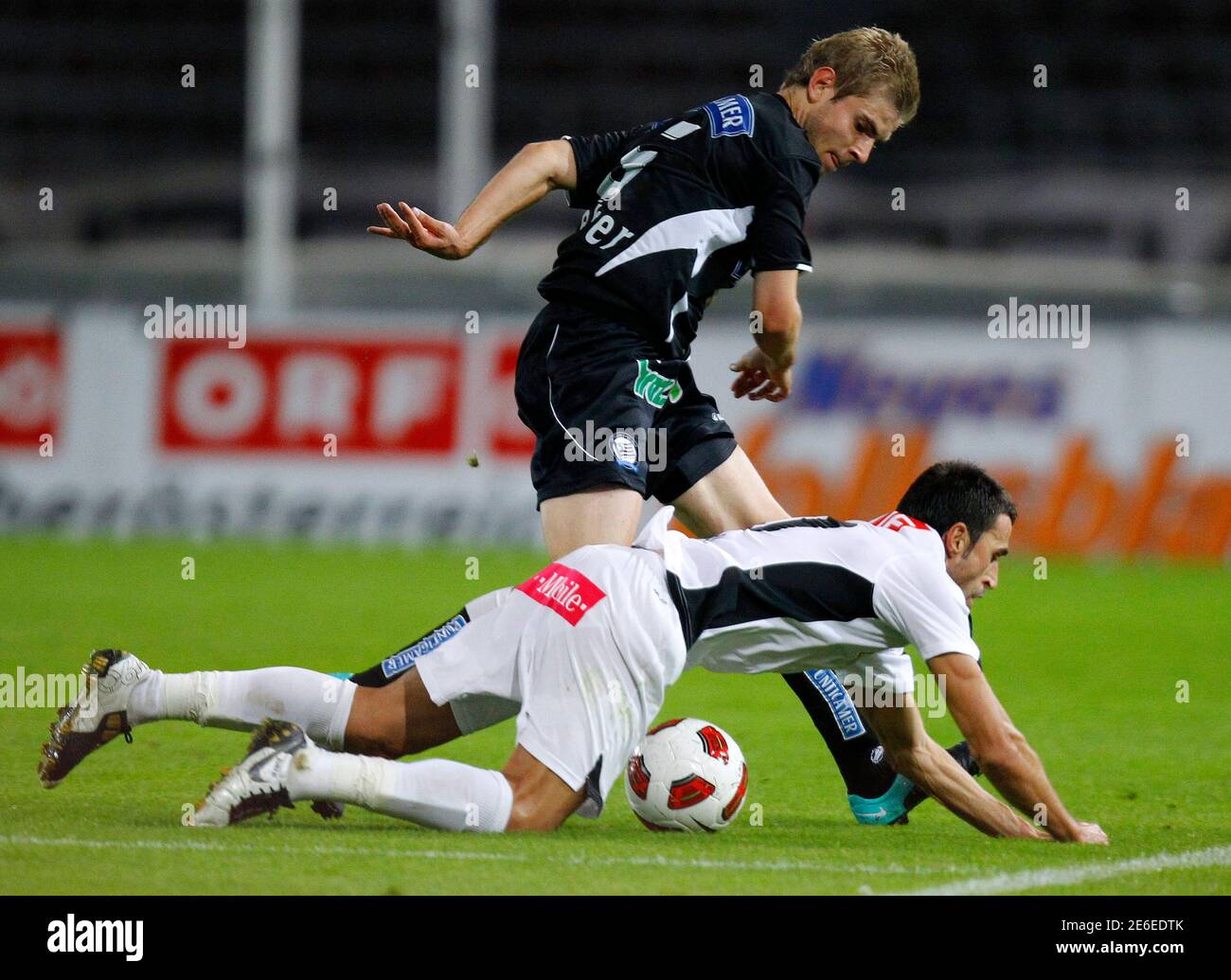 Lask Linz S Klodian Duro Bottom And Sturm Graz S Manuel Weber Fight For The Ball During Their Austrian League Soccer Match In Linz September 21 2010 Reuters Dominic Ebenbichler Austria Tags Sport Soccer
