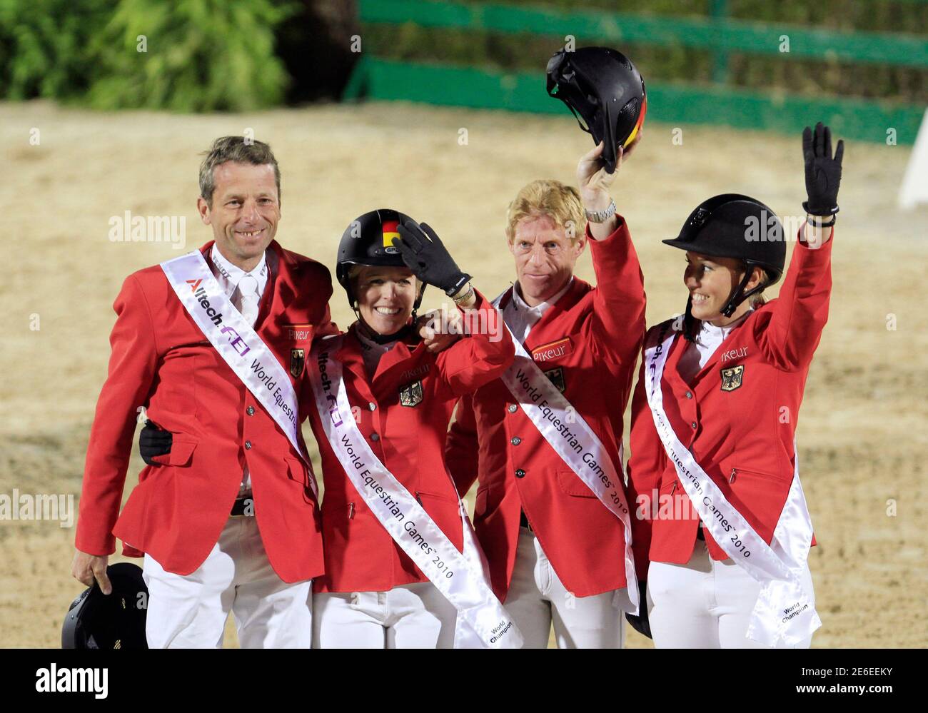 Members Of The German Jumping Team L R Carsten Otto Nagel Meredith Michaels Beerbaum Murcus Ehning And Janne Friederike Meyer Celebrate After Winning Gold Medal In World Championship At Equestrian 