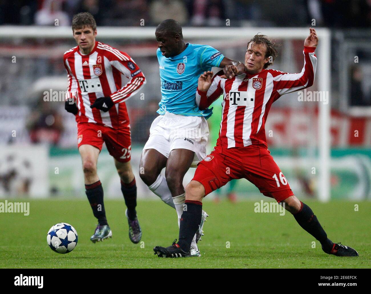 Andreas Ottl R Of Bayern Munich Tackles Dominique Kivuvu Of Cfr Cluj C During Their Champions League Soccer Match In Munich October 19 2010 Reuters Michaela Rehle Germany Tags Sport Soccer Stock