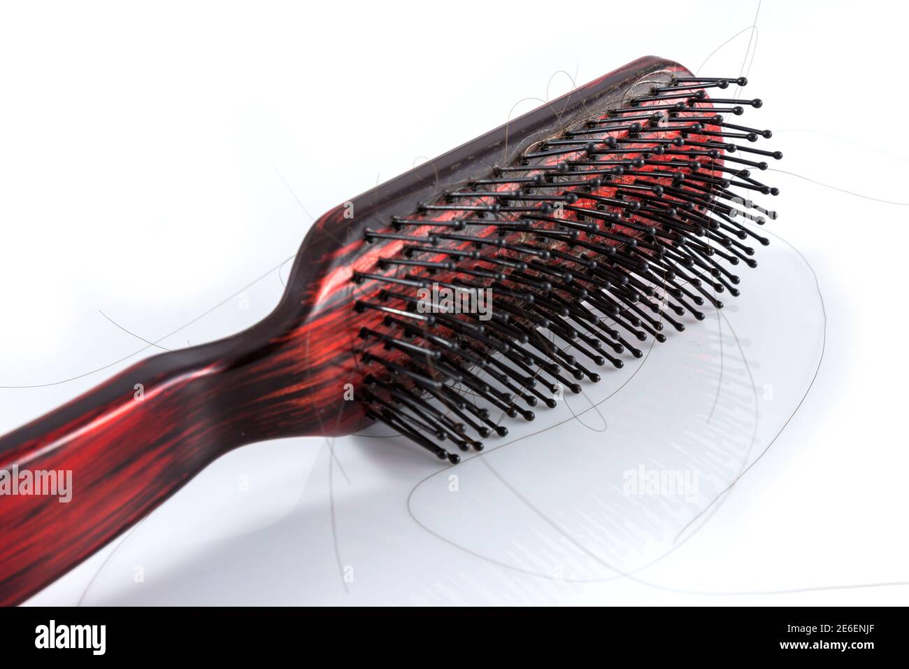 Comb and hair on white background Stock Photo