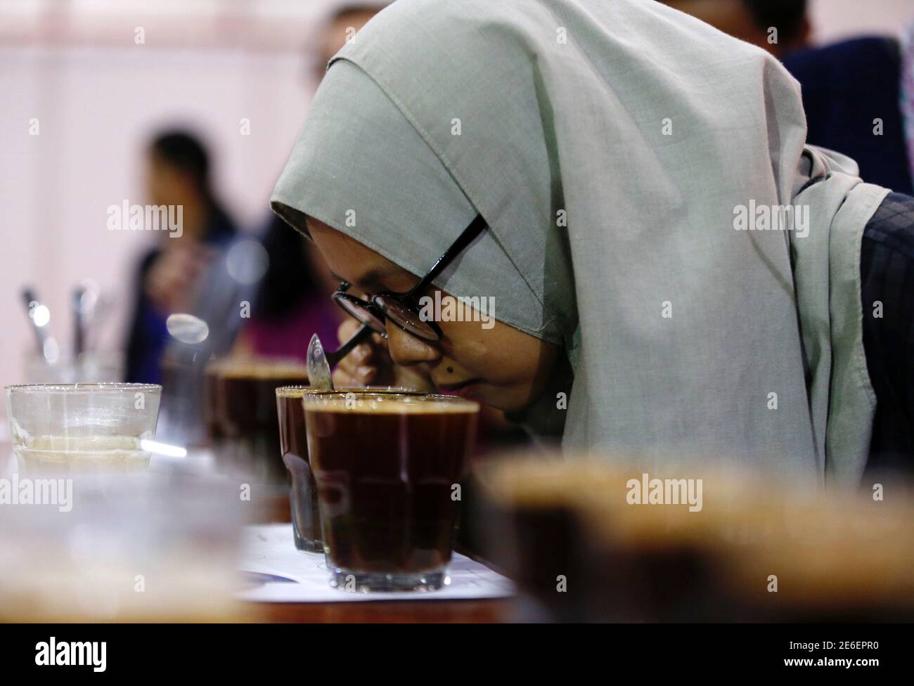 A Woman Takes Part In A Coffee Cupping Class With Indonesian Coffee At A Trade Exhibition In Jakarta Indonesia October 12 2016 Reuters Darren Whiteside Stock Photo Alamy