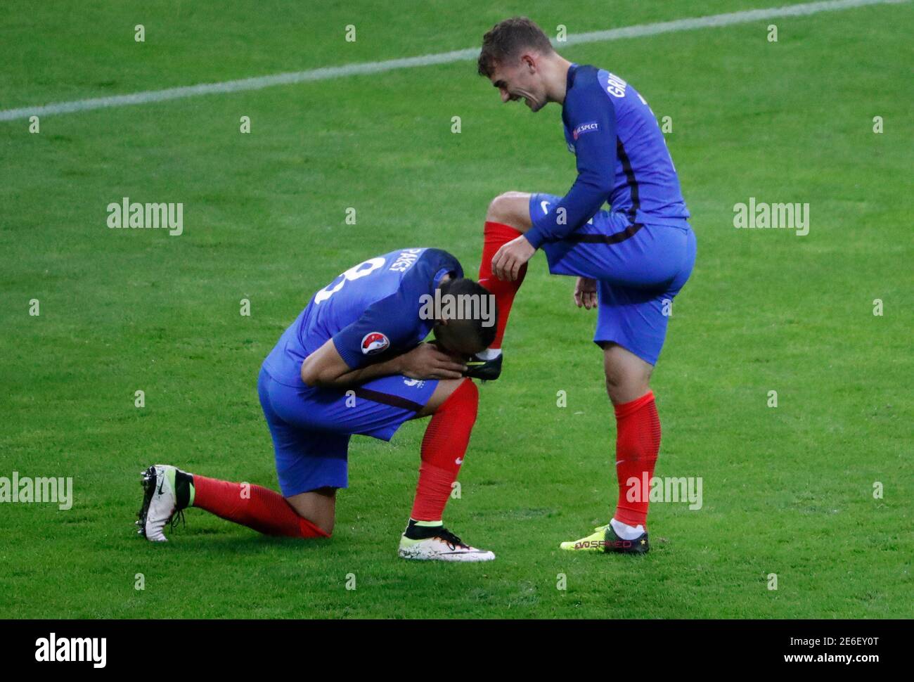 Football Soccer - France v Iceland - EURO 2016 - Quarter final - Stade De  France - Paris Saint-Denis, France - 3/7/16 France's Dimitri Payet kisses  the boot of Antoine Griezmann REUTERS/Charles
