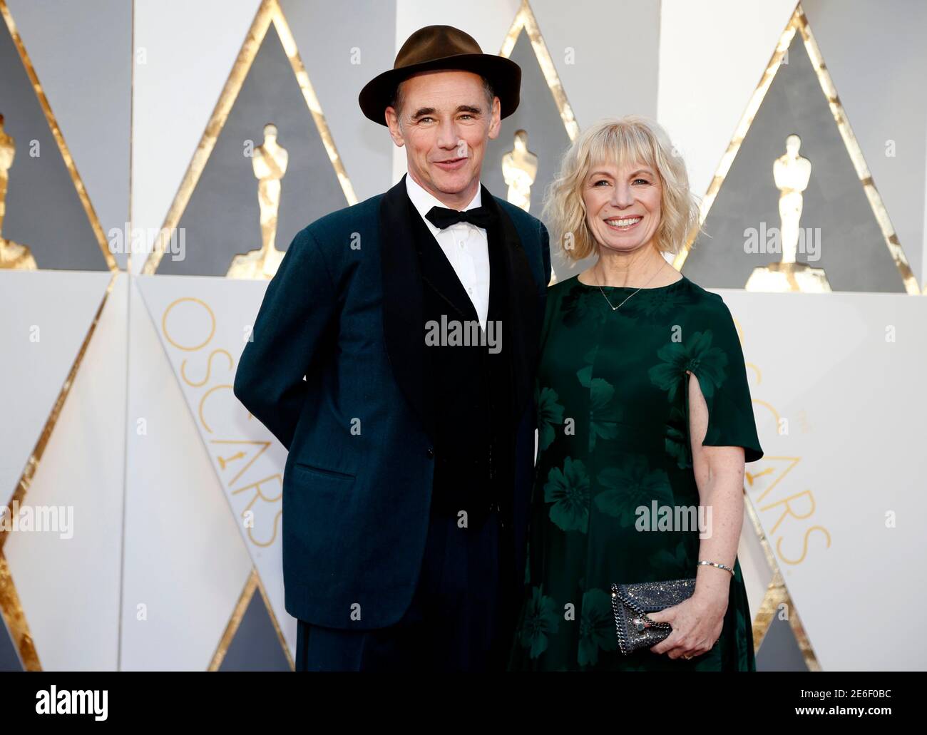 Mark Rylance, nominated for Best Supporting Actor for his role in 'Bridge of Spies,' arrives with wife Claire van Kampen at the 88th Academy Awards in Hollywood, California February 28, 2016.  REUTERS/Lucy Nicholson Stock Photo