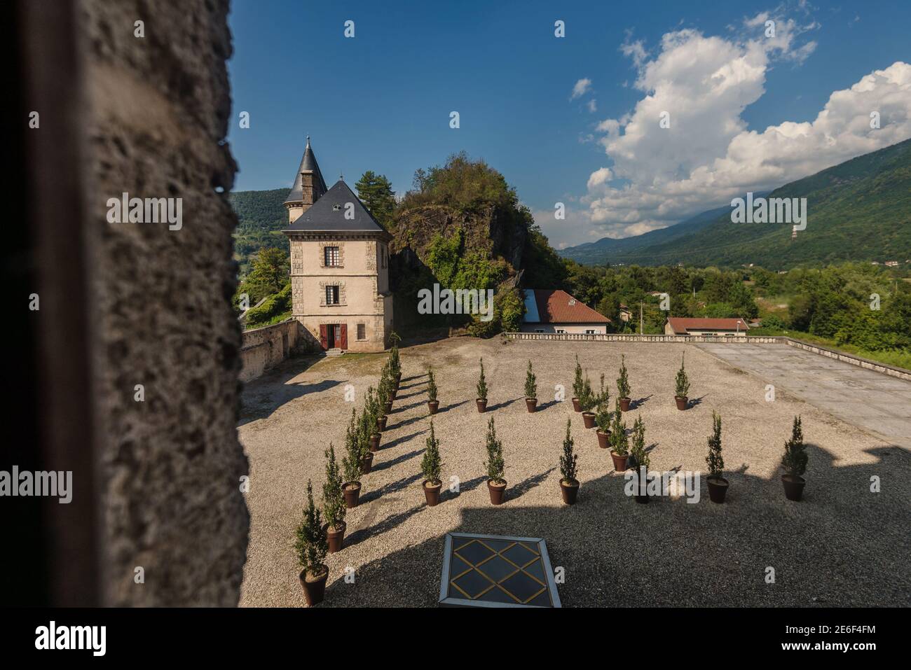 Domaine de Vizille Overlooks Courtyard and Alps Stock Photo