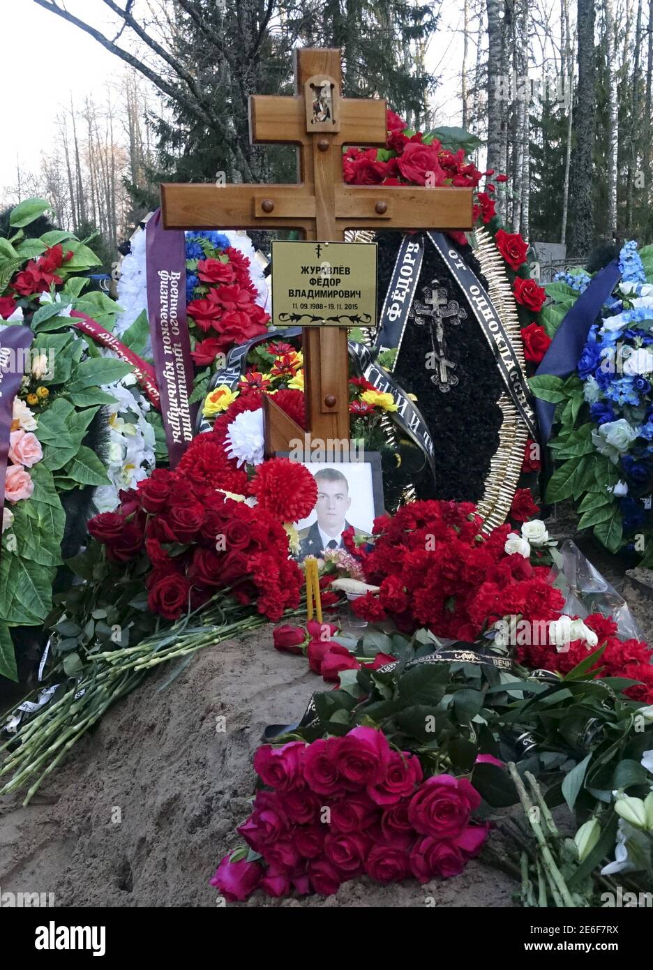 The grave of Russian serviceman Fyodor Zhuravlyov is seen after his funeral  at a cemetery in the village of Paltso, Bryansk region, Russia, November  24, 2015. Russian serviceman Fyodor Zhuravlyov left home