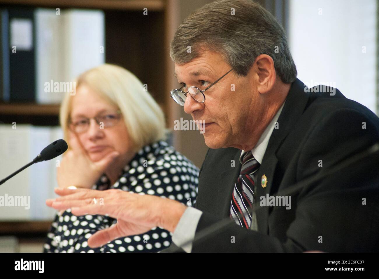 North Dakota Attorney General Wayne Stenehjem speaks during an Industrial Commission meeting in Bismarck, North Dakota September 24, 2015. North Dakota regulators on Thursday gave the energy industry 10 extra months to reduce the amount of natural gas burned off at oil wells, acquiescing to industry worries that construction delays have made it all but impossible to meet existing targets.    REUTERS/Andrew Cullen Stock Photo