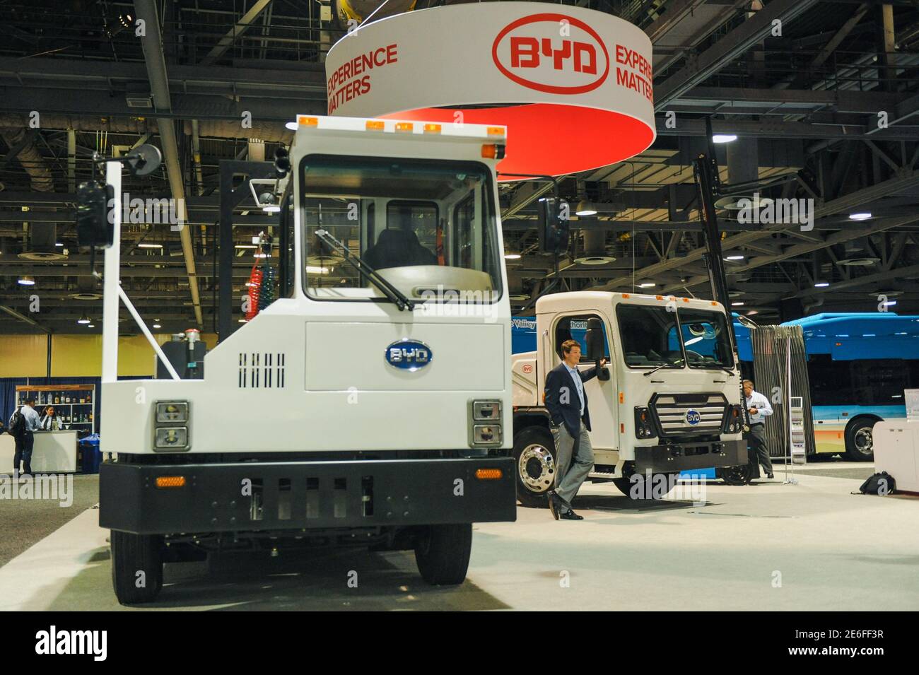 The BYD8Y (L) and the BYD8R, both plug-in electric trucks, are displayed at the BYD booth during the Advanced Clean Transportation Expo, held at the Long Beach Convention Center in Long Beach, California, U.S. May 3, 2017. REUTERS/Andrew Cullen Stock Photo